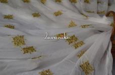 100 Grams Gold Zari Embroidery Buttas with Faux Mirrors on Dyeable Viscose Georgette 44inch